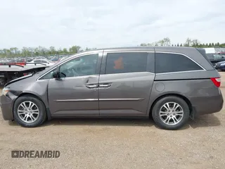 2011 Honda Odyssey EX-L with VIN 5FNRL5H68BB100274, listed as a IAAI auction lot 42159787 with 205,616 mi miles and . Bid and sale history available at carsss.com. Image 14.