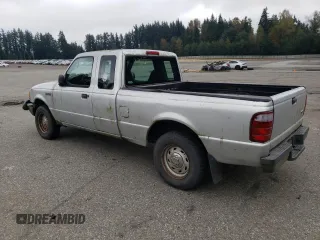 2003 Ford Ranger with VIN 1FTZR44V23PB34014, listed as a Copart auction lot 71331354 with 212,835 mi miles and Clean Title. Bid and sale history available at DreamBid. Image 2.