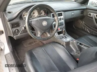 2001 Mercedes-Benz SLK 230 Kompressor with VIN WDBKK49F21F193606, listed as a Copart auction lot 47139945 with 156,424 mi miles and Salvage title. Bid and sale history available at DreamBid. Image 8.