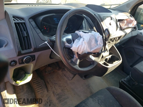 2015 Ford Transit with VIN 1FTNE1CM9FKA51425, listed as a Copart auction lot 70039184 with 146,782 mi miles and Salvage Title. Bid and sale history available at DreamBid. Image 8.