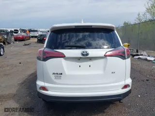 2018 Toyota RAV4 LE with VIN JTMZFREV9JJ192075, listed as a IAAI auction lot 41860513 with 64,586 mi miles. Bid and sale history available at carsss.com. Image 16.