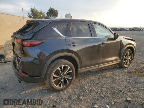 2023 Mazda CX-5 2.5 S Premium Plus Package with VIN JM3KFBEM7P0170811, listed as a Copart auction lot 87335674 with 43,799 mi miles and Salvage Title. Bid and sale history available at carsss.com. Image 3.