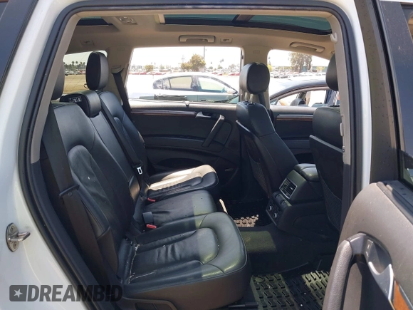 2014 Audi Q7 Premium Plus with VIN WA1LGAFE3ED021002, listed as a IAAI auction lot 42769562 with 82,118 mi miles and . Bid and sale history available at DreamBid. Image 8.