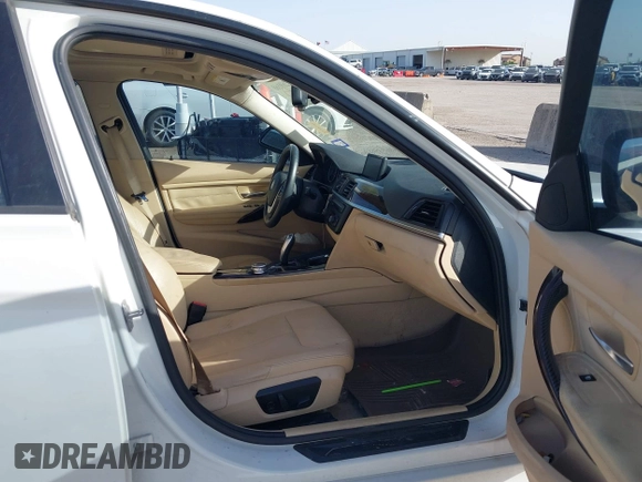 2014 BMW 3 Series 328i with VIN WBA3A5G5XENP32345, listed as a IAAI auction lot 42303835 with 100,235 mi miles and . Bid and sale history available at DreamBid. Image 5.