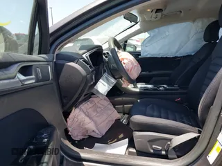 2015 Ford Fusion SE Hybrid with VIN 3FA6P0LU4FR305908, listed as a IAAI auction lot 42539627 with 91,467 mi miles and . Bid and sale history available at DreamBid. Image 5.
