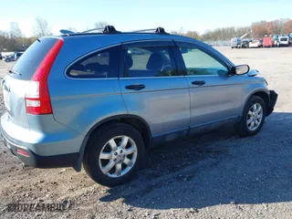 2007 Honda CR-V EX with VIN JHLRE48577C024338, listed as a IAAI auction lot 42068770 with 197,943 mi miles. Bid and sale history available at carsss.com. Image 4.