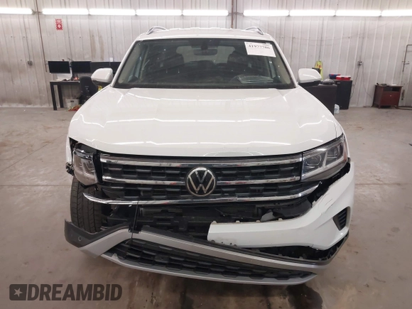 2021 Volkswagen Atlas SE z VIN 1V2HR2CA3MC539997, wystawiony jako IAAI lot #41977786 z przebiegiem 77 372 mil mil oraz . Historia ofert i sprzedaży dostępna na DreamBid. Obrazek 13.