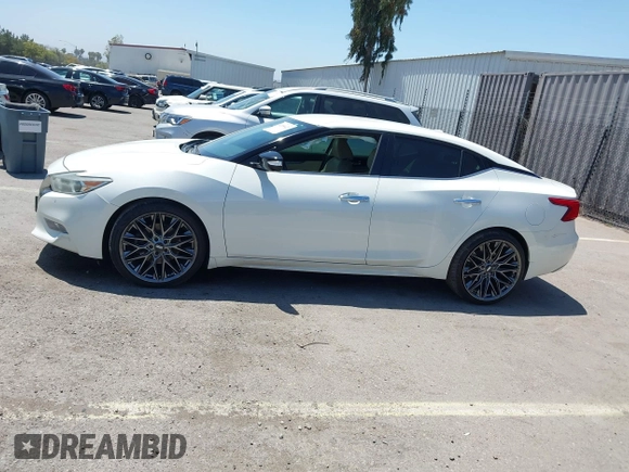 2016 Nissan Maxima SV with VIN 1N4AA6AP6GC903638, listed as a IAAI auction lot 42180421 with 124,586 mi miles and . Bid and sale history available at DreamBid. Image 14.