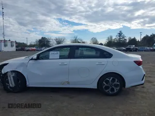 2019 Kia Forte LXS z VIN 3KPF24AD2KE042693, wystawiony jako IAAI lot #41902468 z przebiegiem 126 516 mil mil oraz . Historia ofert i sprzedaży dostępna na DreamBid. Obrazek 14.