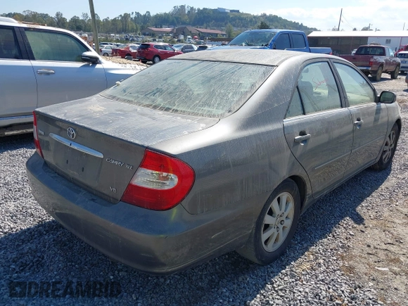2004 Toyota Camry LE with VIN 4T1BF30K94U576450, listed as a IAAI auction lot 40541915 with Not Provided miles and . Bid and sale history available at carsss.com. Image 4.
