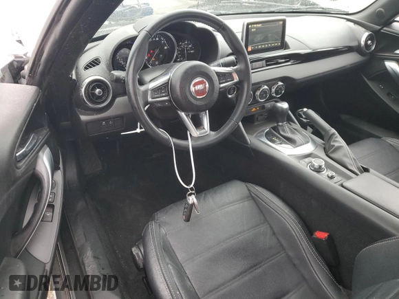 2017 FIAT 124 Spider Lusso z VIN JC1NFAEK0H0127134, wystawiony jako Copart lot #56334925 z przebiegiem 12 367 mil mil oraz Szkoda całkowita • Salvage title. Historia ofert i sprzedaży dostępna na DreamBid. Obrazek 8.