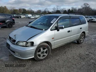 1995 Honda Odyssey with VIN RA21049652, listed as a Copart auction lot 85426404 with 271,632 mi miles and Clean title. Bid and sale history available at DreamBid. Image 1.