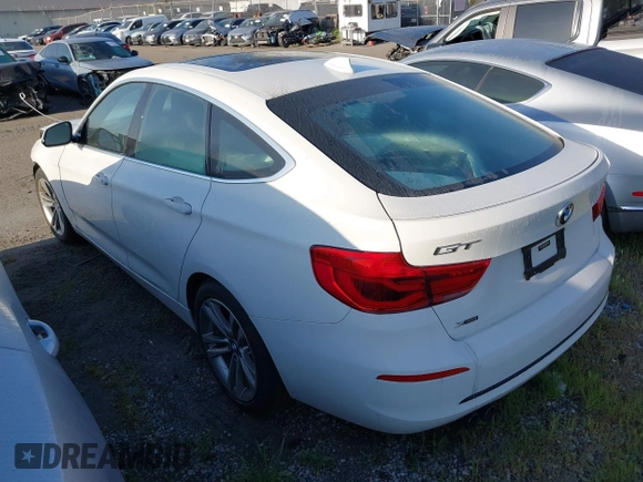 2018 BMW 3 Series 330i xDrive with VIN WBA8Z9C5XJG828406, listed as a IAAI auction lot 41236150 with 36,815 mi miles. Bid and sale history available at carsss.com. Image 3.