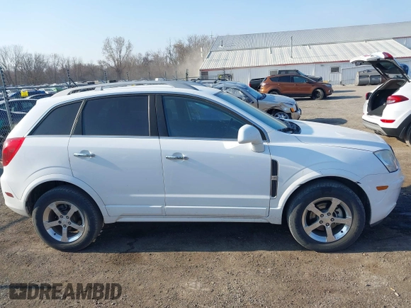2014 Chevrolet Captiva Sport LT z VIN 3GNAL3EK8ES557432, wystawiony jako IAAI lot #42018256 z przebiegiem 92 569 mil mil oraz . Historia ofert i sprzedaży dostępna na DreamBid. Obrazek 13.