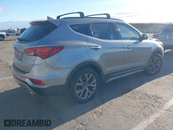 2018 Hyundai Santa Fe Ultimate z VIN 5XYZW4LA1JG515019, wystawiony jako IAAI lot #42248389 z przebiegiem 60 222 mil mil oraz . Historia ofert i sprzedaży dostępna na DreamBid. Obrazek 4.