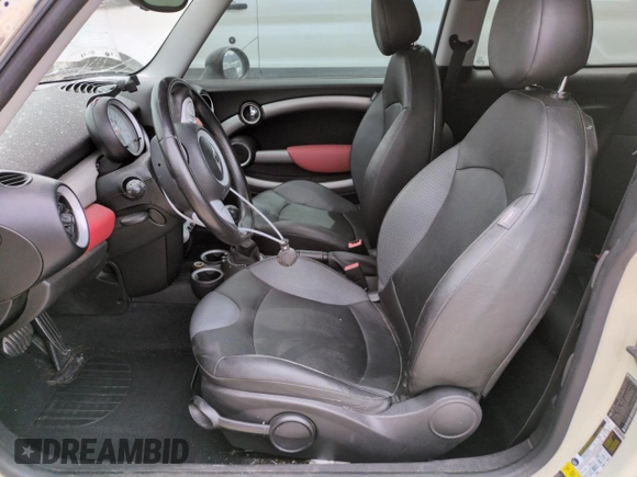 2009 MINI Hardtop S with VIN WMWMF73569TW87347, listed as a Copart auction lot 59445035 with Not provided miles and Salvage title. Bid and sale history available at DreamBid. Image 7.
