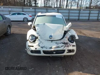 2008 Volkswagen New Beetle Coupe Triple White with VIN 3VWFW31C88M515319, listed as a IAAI auction lot 41564418 with 150,486 mi miles. Bid and sale history available at carsss.com. Image 12.