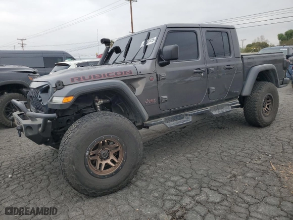 2021 Jeep Gladiator Rubicon with VIN 1C6JJTBG9ML512347, listed as a Copart auction lot 43197415 with 134,608 mi miles and Salvage Title. Bid and sale history available at carsss.com. Image 1.
