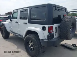 2018 Jeep Wrangler Unlimited Sahara with VIN 1C4HJWEG1JL801934, listed as a IAAI auction lot 42072968 with 112,432 mi miles and . Bid and sale history available at DreamBid. Image 3.