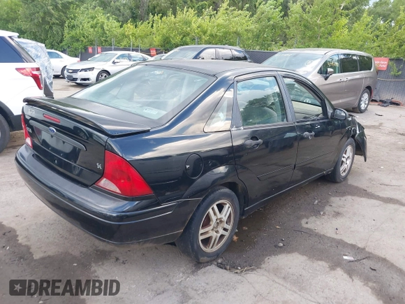 2000 Ford Focus SE with VIN 1FAFP3431YW182169, listed as a IAAI auction lot 42539335 with Not provided miles and . Bid and sale history available at DreamBid. Image 4.
