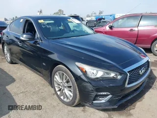2018 Infiniti Q50 Luxe z VIN JN1EV7AP9JM358741, wystawiony jako IAAI lot #42345835 z przebiegiem 101 544 mil mil oraz . Historia ofert i sprzedaży dostępna na DreamBid. Obrazek 1.