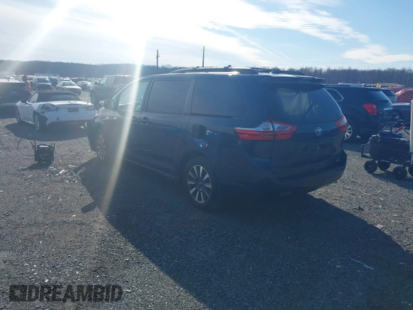 2018 Toyota Sienna LE with VIN 5TDJZ3DC4JS189041, listed as a IAAI auction lot 41610754 with 61,862 mi miles and . Bid and sale history available at DreamBid. Image 3.