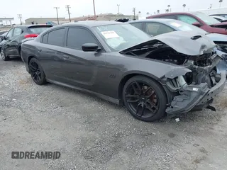 2019 Dodge Charger R/T z VIN 2C3CDXCTXKH542225, wystawiony jako IAAI lot #42192198 z przebiegiem 64 488 mil mil oraz . Historia ofert i sprzedaży dostępna na DreamBid. Obrazek 1.