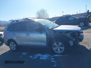 2014 Subaru Forester Premium with VIN JF2SJAEC4EH555249, listed as a IAAI auction lot 41369482 with 175,734 mi miles and . Bid and sale history available at DreamBid. Image 12.