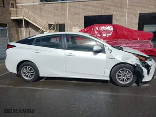2019 Toyota Prius L Eco with VIN JTDKARFU7K3093038, listed as a IAAI auction lot 41768066 with 124,495 mi miles. Bid and sale history available at carsss.com. Image 13.