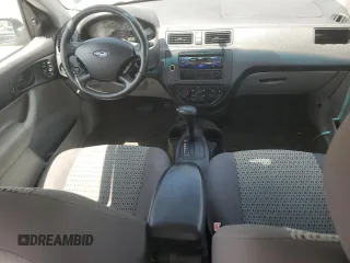 2006 Ford Focus S with VIN 1FAFP34N76W246035, listed as a Copart auction lot 61985015 with 196,498 mi miles and Salvage title. Bid and sale history available at DreamBid. Image 8.