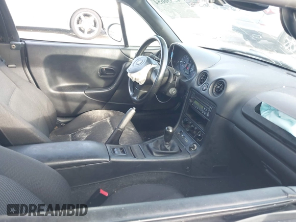 1999 Mazda MX-5 Miata with VIN JM1NB3534X0124237, listed as a IAAI auction lot 42536654 with 92,696 mi miles and . Bid and sale history available at DreamBid. Image 5.