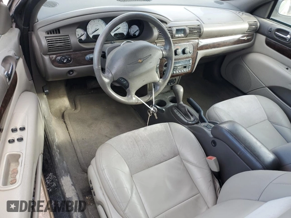 2004 Chrysler Sebring Limited z VIN 1C3EL65R14N257513, wystawiony jako Copart lot #84049844 z przebiegiem 82 402 mil mil oraz Szkoda całkowita • Salvage title. Historia ofert i sprzedaży dostępna na DreamBid. Obrazek 8.