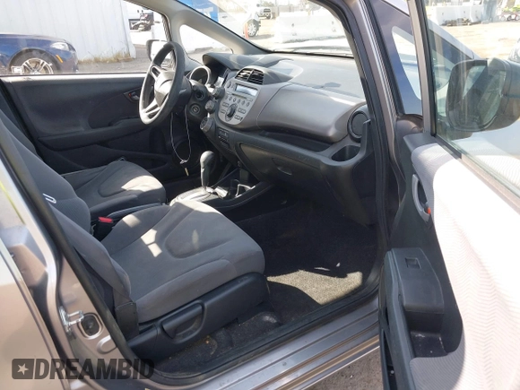 2010 Honda Fit with VIN JHMGE8H25AS020639, listed as a IAAI auction lot 41963459 with 172,560 mi miles. Bid and sale history available at carsss.com. Image 5.