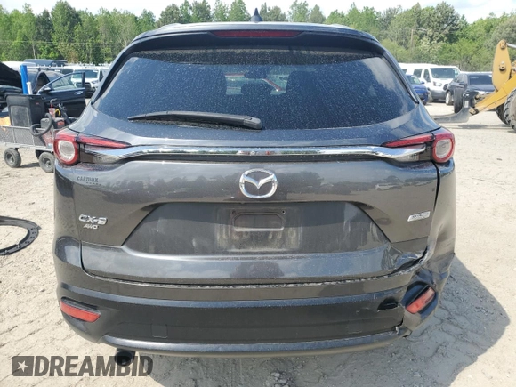 2018 Mazda CX-9 Sport с VIN JM3TCBBY8J0212592, выставлен на аукционе Copart как лот 54555875 с пробегом 124 684 миль миль и Списание • Salvage title. История ставок и продаж доступна на DreamBid. Изображение 6.