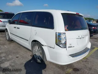 2015 Dodge Grand Caravan American Value Pkg with VIN 2C4RDGBGXFR549962, listed as a IAAI auction lot 41515525 with 199,962 mi miles. Bid and sale history available at carsss.com. Image 3.