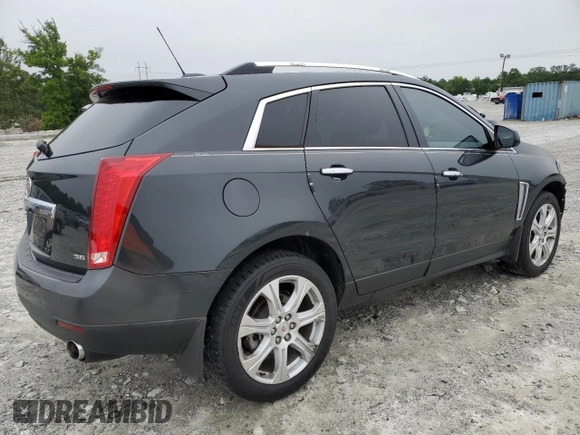 2015 Cadillac SRX Performance Collection with VIN 3GYFNCE38FS597717, listed as a Copart auction lot 57629615 with 102,689 mi miles and Salvage title. Bid and sale history available at DreamBid. Image 3.