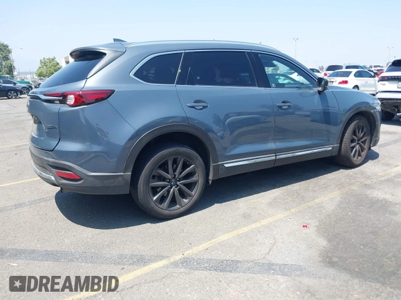 2022 Mazda CX-9 Grand Touring with VIN JM3TCBDY1N0611766, listed as a IAAI auction lot 42452059 with 60,755 mi miles and . Bid and sale history available at DreamBid. Image 4.