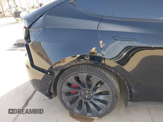 2022 Tesla Model Y Performance with VIN 7SAYGDEF6NF532027, listed as a IAAI auction lot 41717662 with 36,537 mi miles and . Bid and sale history available at DreamBid. Image 6.