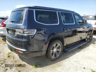 2023 Jeep Grand Wagoneer with VIN 1C4SJVEJ7PS506234, listed as a Copart auction lot 74534244 with 13,586 mi miles and Non repairable. Bid and sale history available at DreamBid. Image 3.