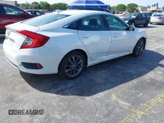 2021 Honda Civic Sedan EX with VIN 2HGFC1F37MH700657, listed as a IAAI auction lot 41633417 with 87,379 mi miles. Bid and sale history available at carsss.com. Image 4.
