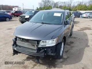 2019 Dodge Journey SE with VIN 3C4PDCBB8KT732028, listed as a IAAI auction lot 41902938 with 49,378 mi miles and . Bid and sale history available at DreamBid. Image 2.