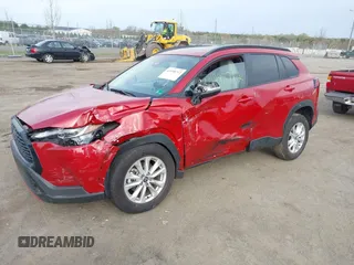2024 Toyota Corolla Cross LE z VIN 7MUBAABG6RV083522, wystawiony jako IAAI lot #41998712 z przebiegiem 11 793 mil mil oraz . Historia ofert i sprzedaży dostępna na DreamBid. Obrazek 2.
