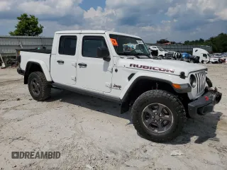 2021 Jeep Gladiator Rubicon z VIN 1C6JJTBG0ML624275, wystawiony jako Copart lot #62840275 z przebiegiem Nie podano mil oraz Szkoda całkowita • Salvage title. Historia ofert i sprzedaży dostępna na DreamBid. Obrazek 4.