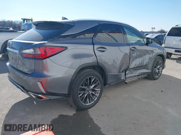 2018 Lexus RX 350 with VIN 2T2BZMCA8JC135823, listed as a IAAI auction lot 41359316 with 103,756 mi miles and . Bid and sale history available at DreamBid. Image 4.