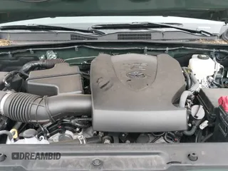 2021 Toyota Tacoma SR with VIN 3TMCZ5AN5MM416655, listed as a IAAI auction lot 42408833 with 63,591 mi miles and . Bid and sale history available at DreamBid. Image 18.