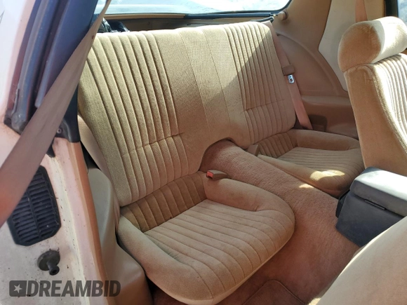 1989 Pontiac Firebird z VIN 1G2FS21S4KL260438, wystawiony jako Copart lot #57420155 z przebiegiem 132 101 mil mil oraz Czysty tytuł • Clean title. Historia ofert i sprzedaży dostępna na DreamBid. Obrazek 11.