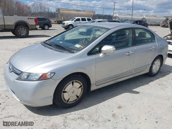 2007 Honda Civic Hybrid with VIN JHMFA36297S019581, listed as a IAAI auction lot 41879187 with 87,297 mi miles. Bid and sale history available at carsss.com. Image 2.