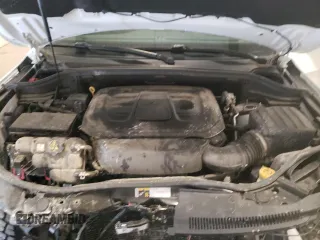 2020 Jeep Grand Cherokee Laredo E with VIN 1C4RJFAG2LC268005, listed as a Copart auction lot 52321235 with 63,285 mi miles and Salvage Title. Bid and sale history available at carsss.com. Image 13.