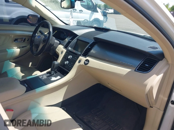 2015 Ford Taurus SEL with VIN 1FAHP2H8XFG203309, listed as a IAAI auction lot 42598215 with 163,190 mi miles and . Bid and sale history available at DreamBid. Image 5.