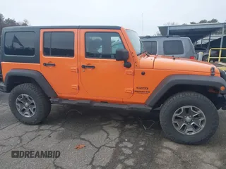 2013 Jeep Wrangler Unlimited Sport z VIN 1C4BJWDG7DL522421, wystawiony jako IAAI lot #41492425 z przebiegiem 55 921 mil mil oraz . Historia ofert i sprzedaży dostępna na DreamBid. Obrazek 13.